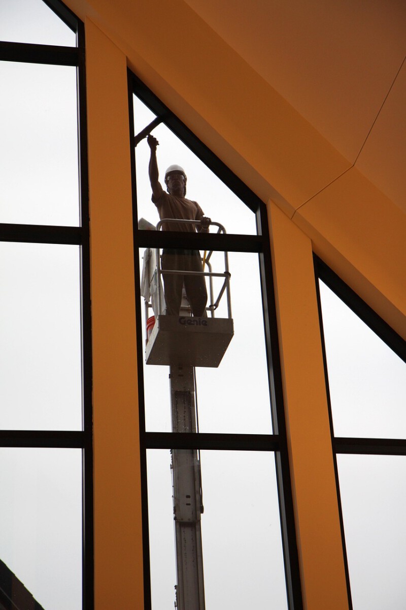 Window washers dress up as superheroes for kids
