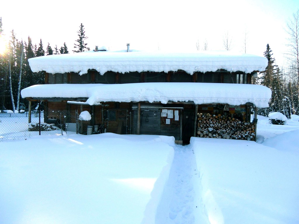 Power out for hundreds of thousands, roadways snarled with ice and snow