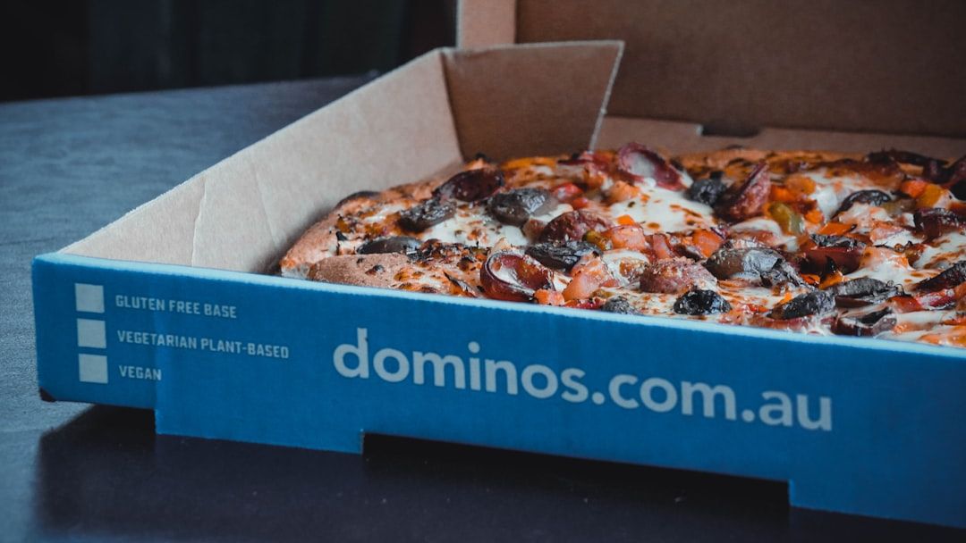 Rothschild Redburn cuts Domino’s Pizza stock price target on delivery market share concerns