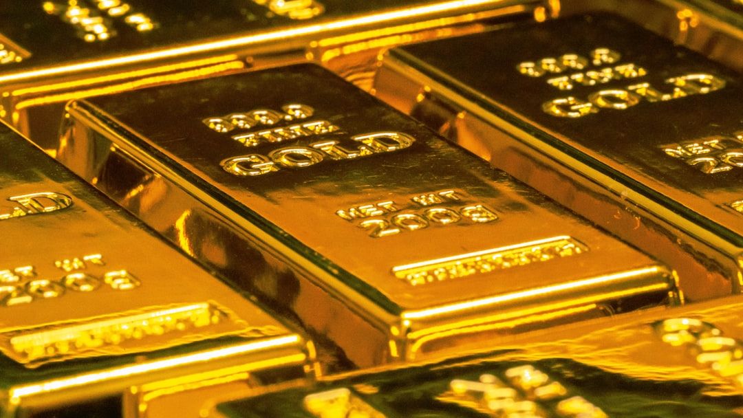 Gold slips as dollar firms, rate cut hopes fade